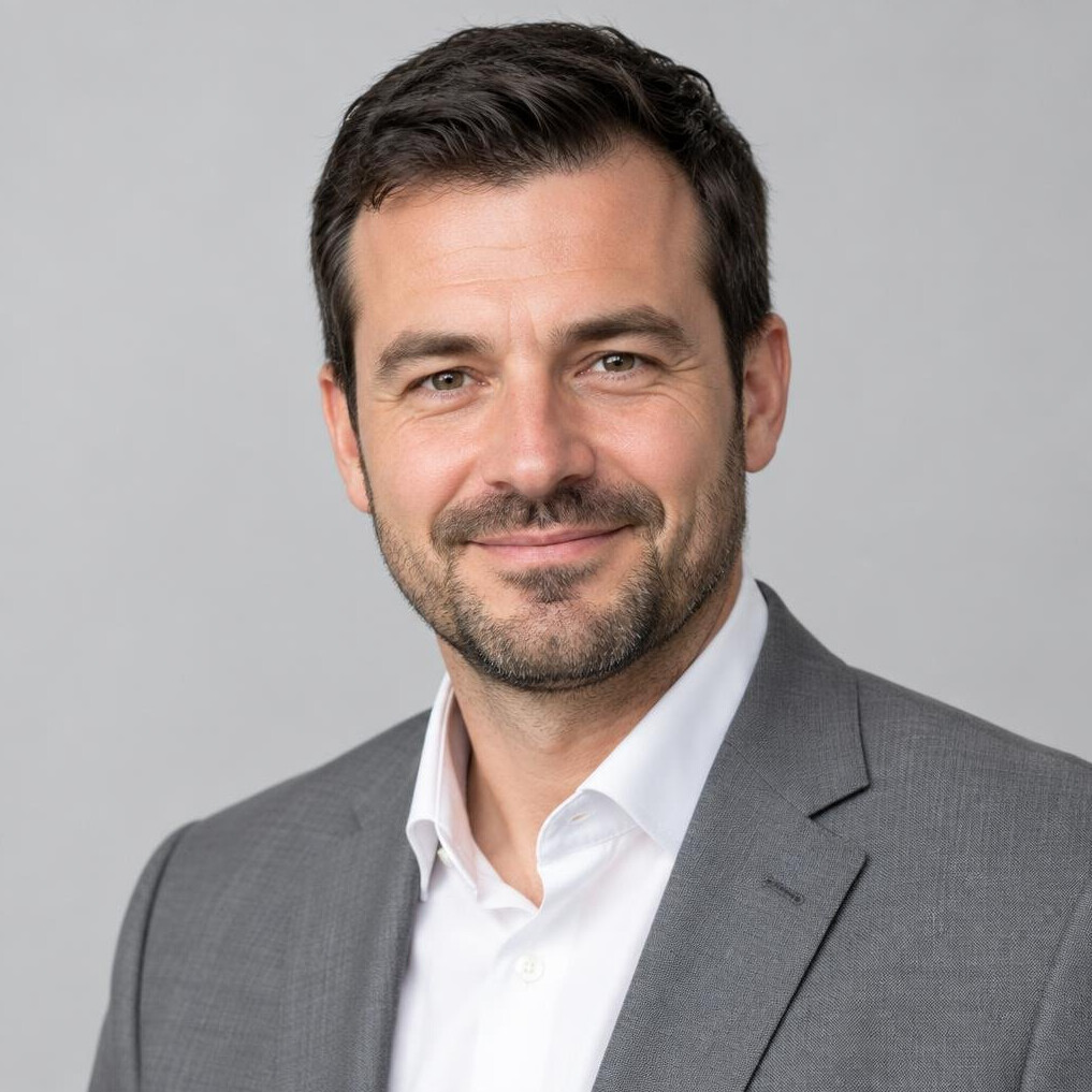 Studio portrait of a smiling European businessman