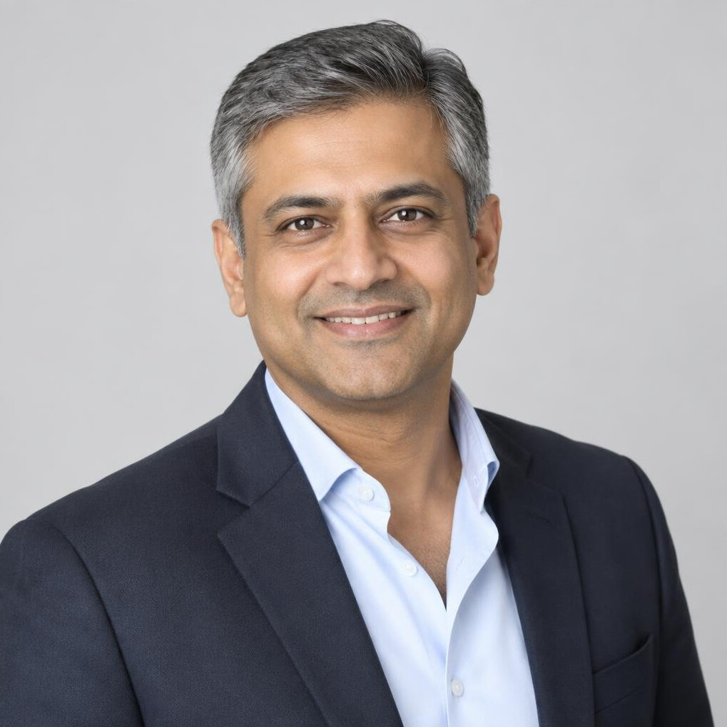 Studio portrait of a smiling South Asian businessman